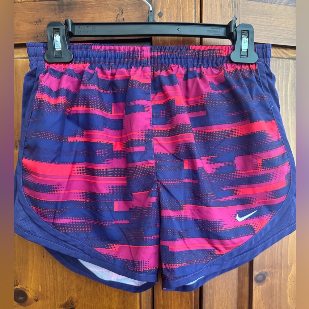 Nike DRIFIT blue/purple with red midrise running shorts. Size Small NWOT